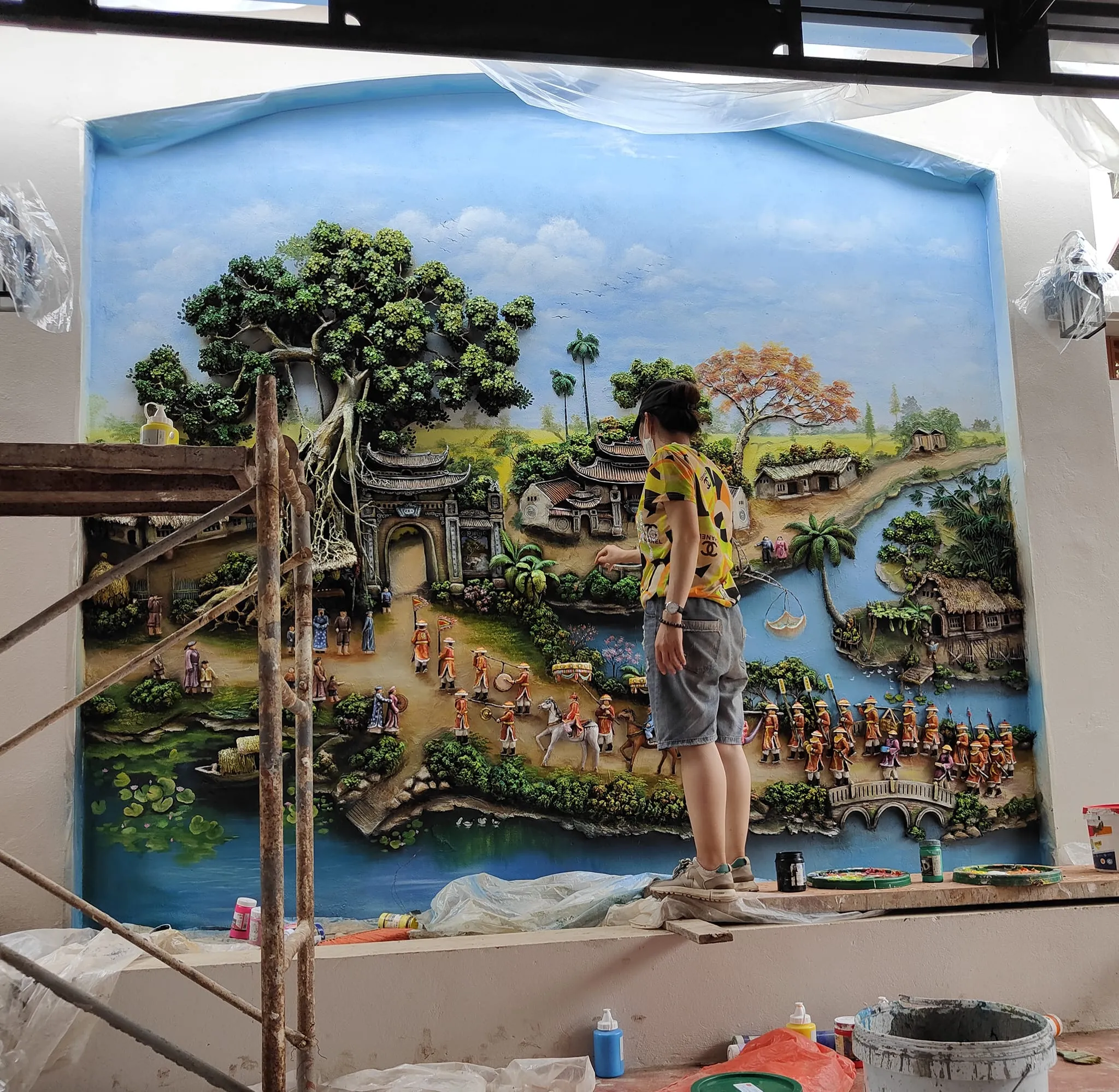 Mẫu phù điêu xi măng trang trí mặt tiền nhà phố