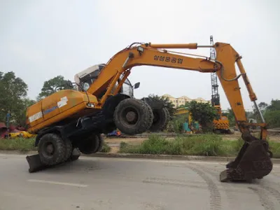 Tổng quan máy đào bánh lốp Samsung MX6W 2 sẵn sàng bàn giao