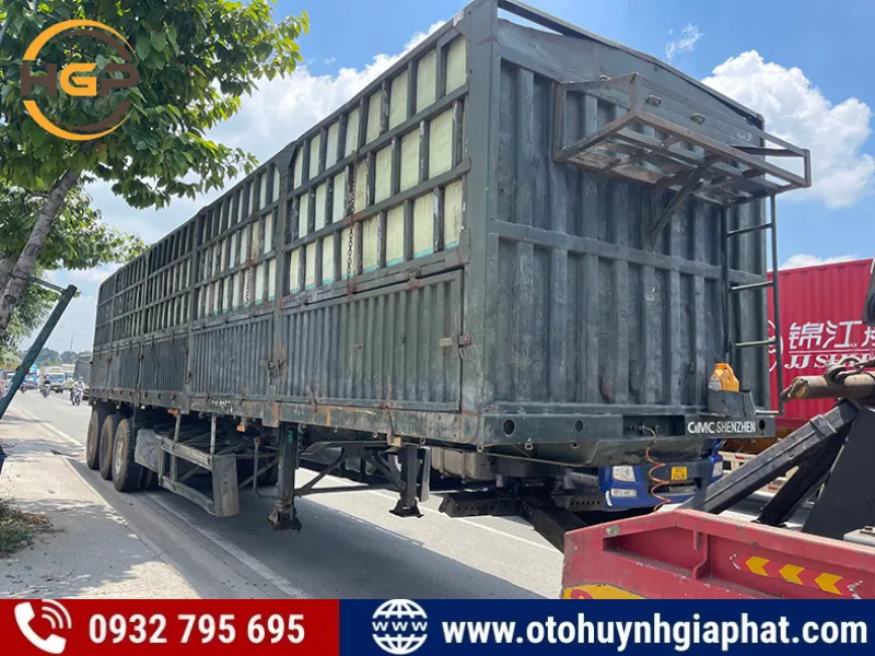 Sơ mi rơ mooc lồng khung mui thương hiệu CIMC loại 3 trục 40 feet tải trọng 32 tấn đã qua sử dụng