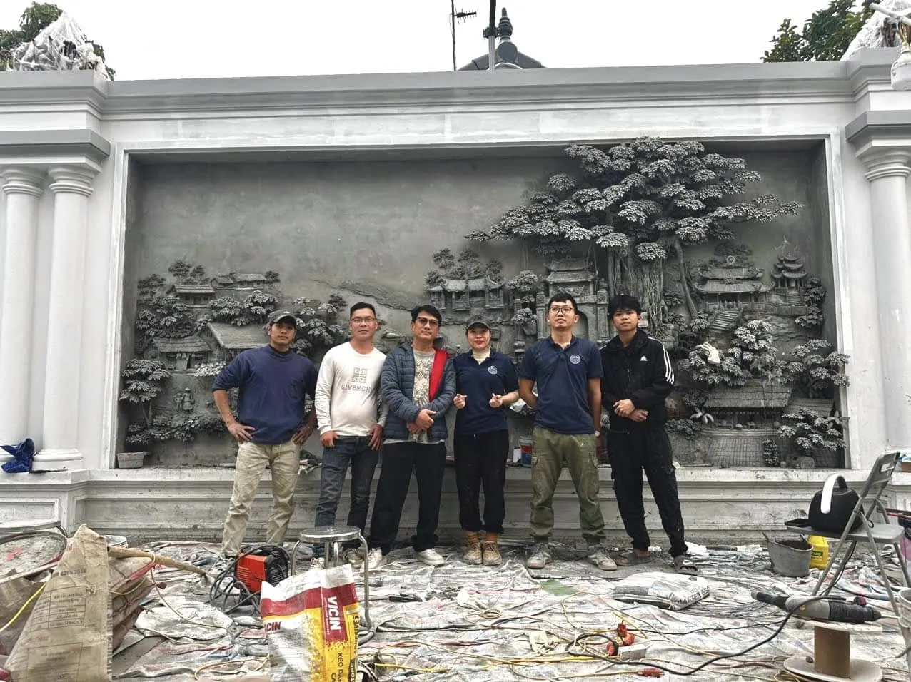 Hình ảnh tranh phù điêu xi măng chủ đề đồng quê Việt Nam