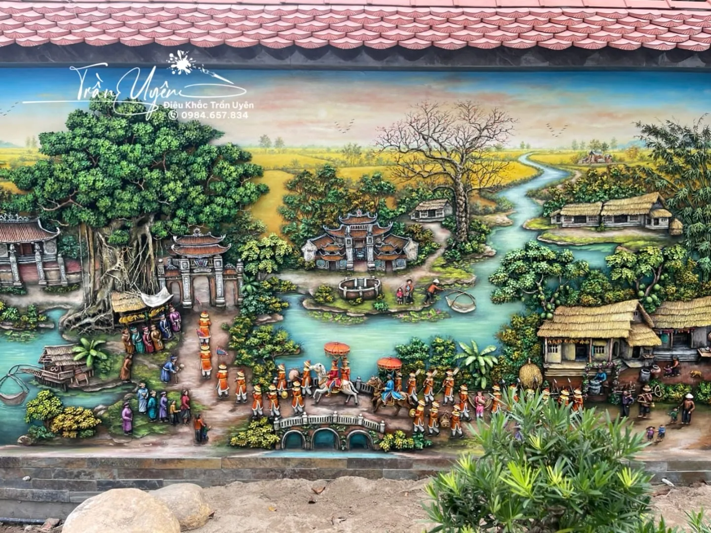 Tác phẩm Vinh Quy Bái Tổ đắp nổi xi măng hoàn thiện